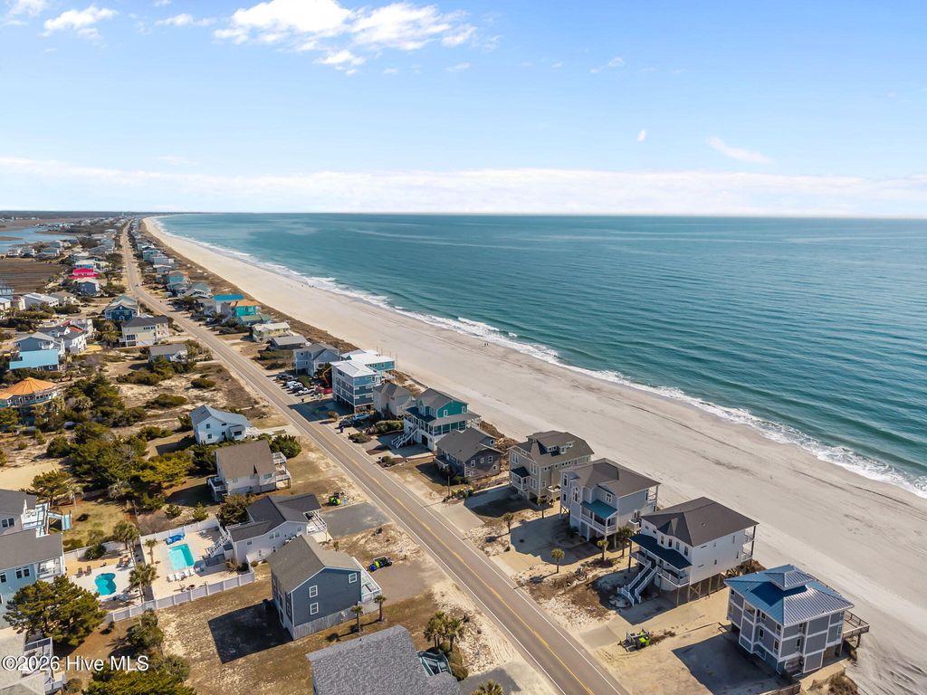 Photo of 6617 W Beach Drive, Oak Island, NC 28465 (MLS # 100554272)