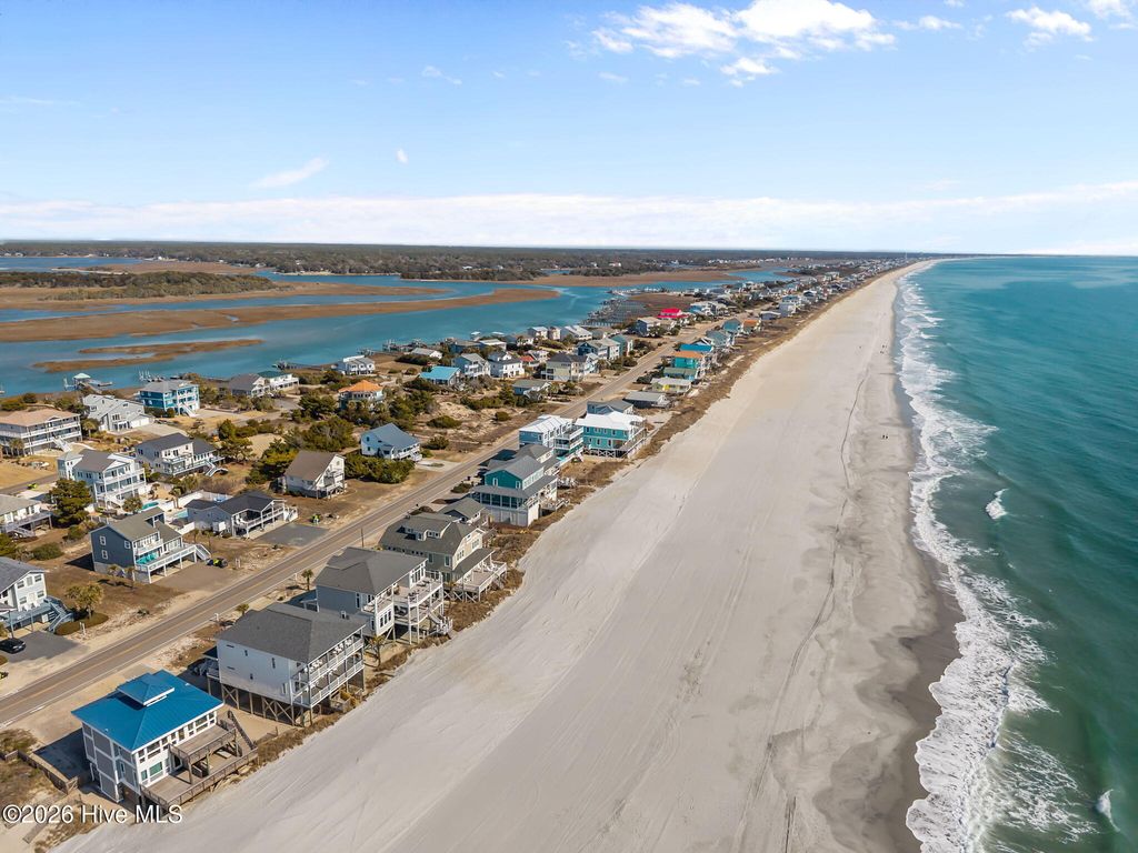 Photo of 6617 W Beach Drive, Oak Island, NC 28465 (MLS # 100554272)