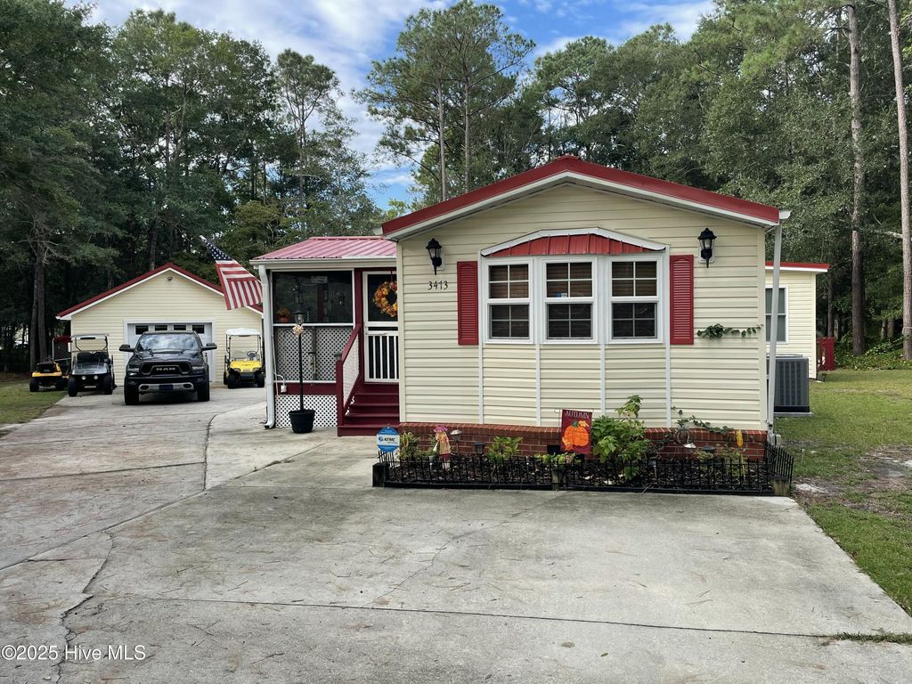 Photo of 3473 Dolphin Drive SE, Bolivia, NC 28422 (MLS # 100534304)