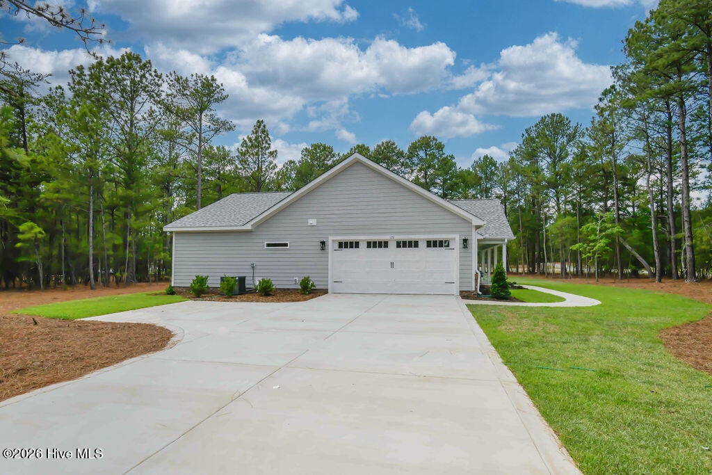 Photo of 120 Edgewater Drive, West End, NC 27376 (MLS # 100587816)