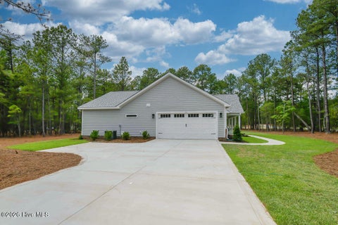 Photo of 120 Edgewater Drive, West End, NC 27376 (MLS # 100587816)