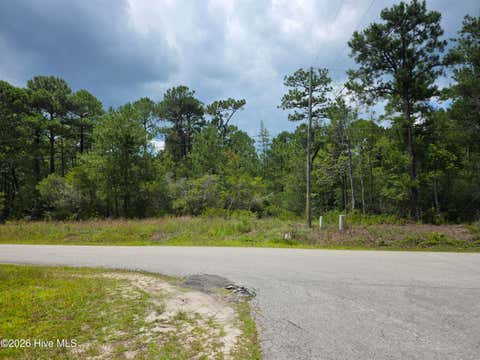 Photo of 1827 Juniper Road, Southport, NC 28461 (MLS # 100593498)