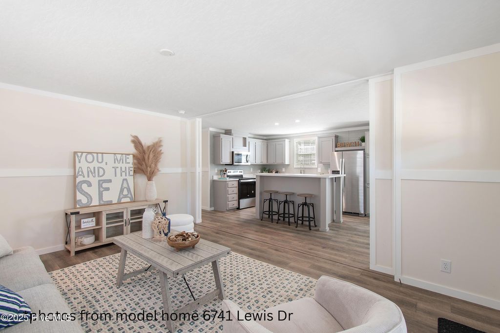 Photo of 6801 Lewis Drive SE, Winnabow, NC 28479 (MLS # 100541882)