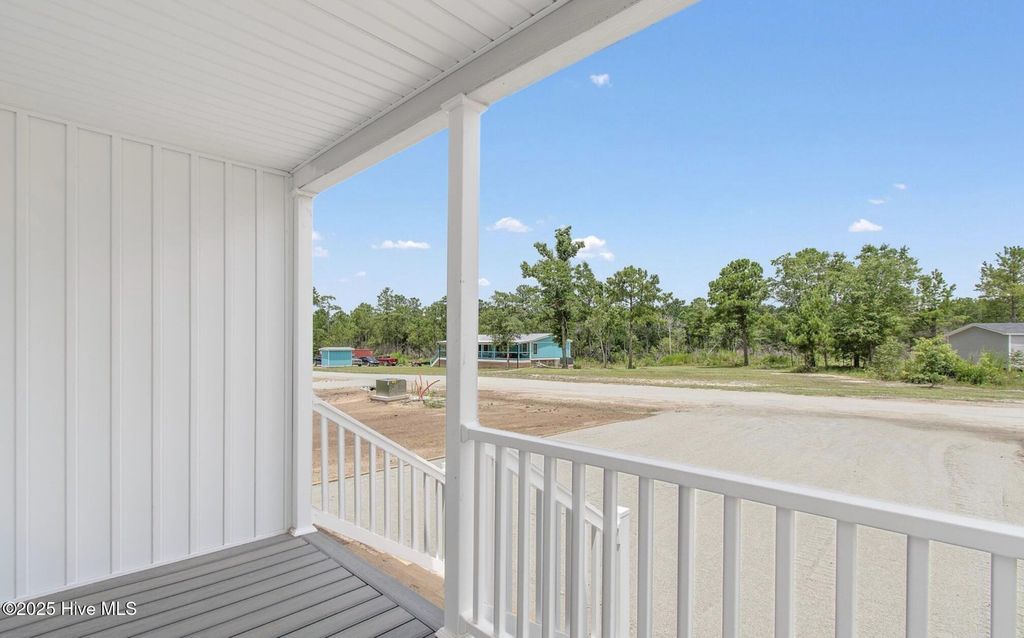 Photo of 6801 Lewis Drive SE, Winnabow, NC 28479 (MLS # 100541882)