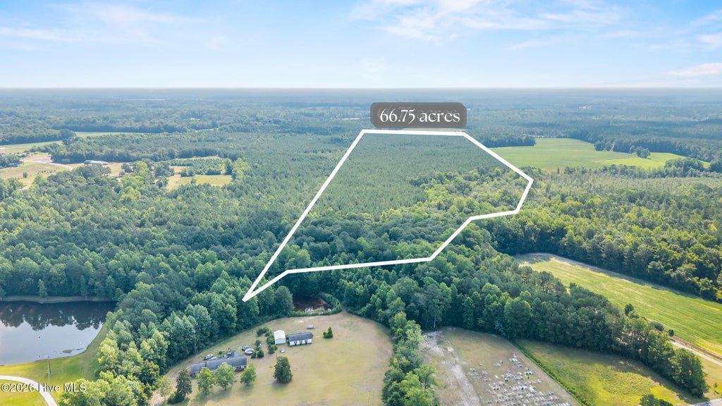 Photo of 0 Near 8944 Chauncey T, Lake Waccamaw, NC 28450 (MLS # 100593782)