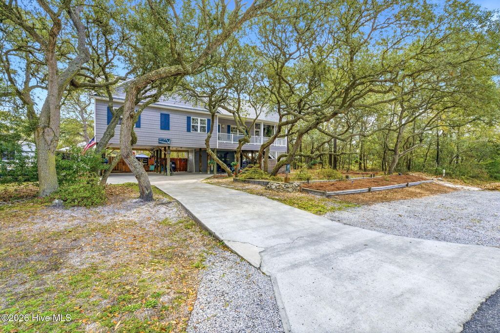 Photo of 108 NW 25th Street, Oak Island, NC 28465 (MLS # 100565063)