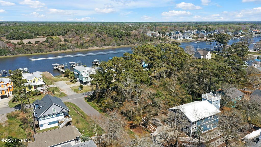 Photo of 37 E Yacht Drive, Oak Island, NC 28465 (MLS # 100564234)