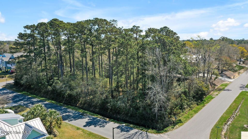 Photo of 37 E Yacht Drive, Oak Island, NC 28465 (MLS # 100564234)