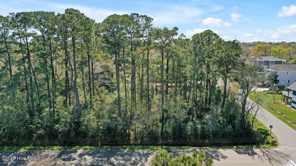Photo of 37 E Yacht Drive, Oak Island, NC 28465 (MLS # 100564234)