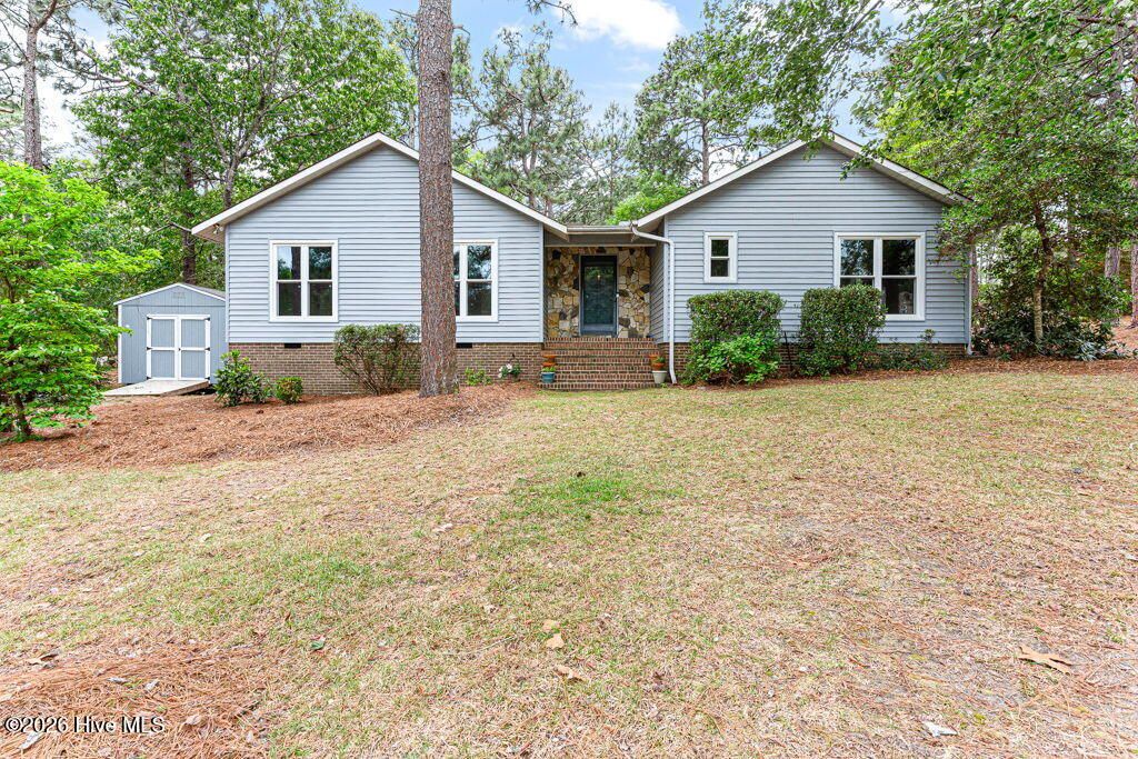 Photo of 420 E Hedgelawn Way, Southern Pines, NC 28387 (MLS # 100568862)