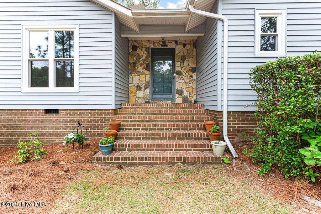 Photo of 420 E Hedgelawn Way, Southern Pines, NC 28387 (MLS # 100568862)