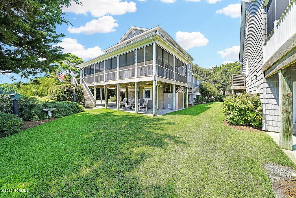 Photo of 115 SW Yacht Drive, Oak Island, NC 28465 (MLS # 100573179)