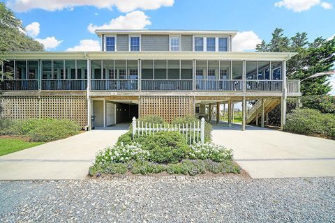 Photo of 115 SW Yacht Drive, Oak Island, NC 28465 (MLS # 100573179)