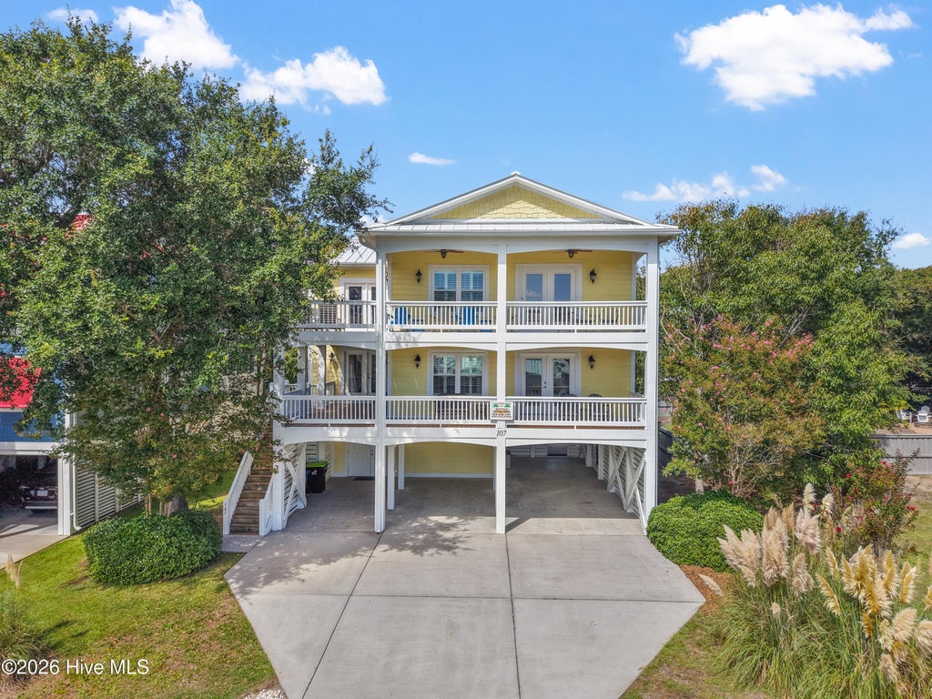 Photo of 107 SE 69th Street, Oak Island, NC 28465 (MLS # 100599122)