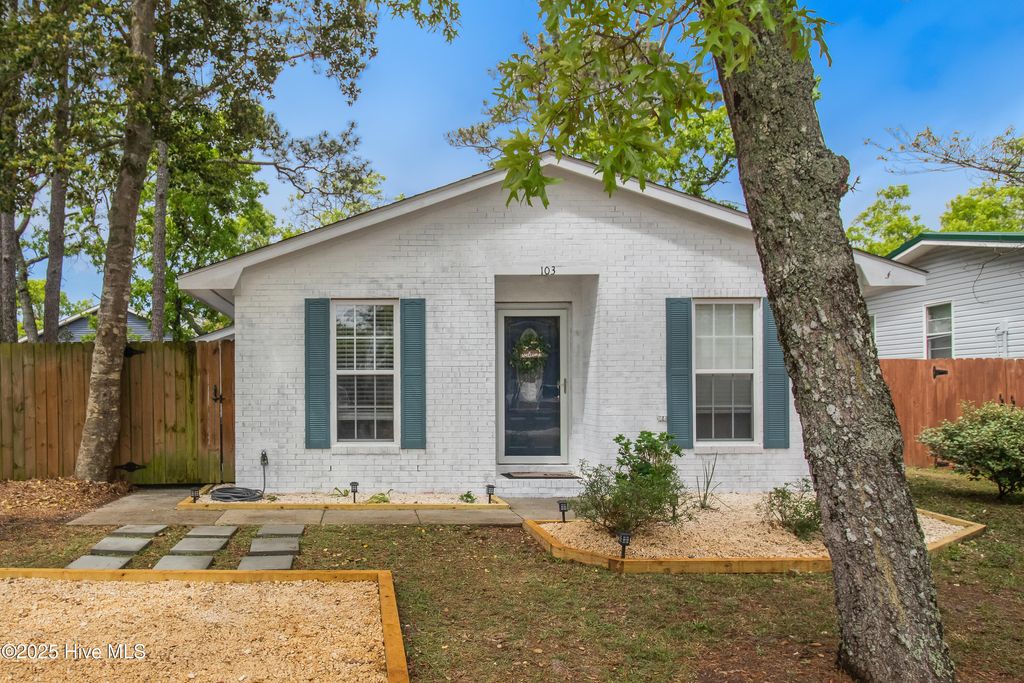 Photo of 103 NE 23rd Street, Oak Island, NC 28465 (MLS # 100550587)