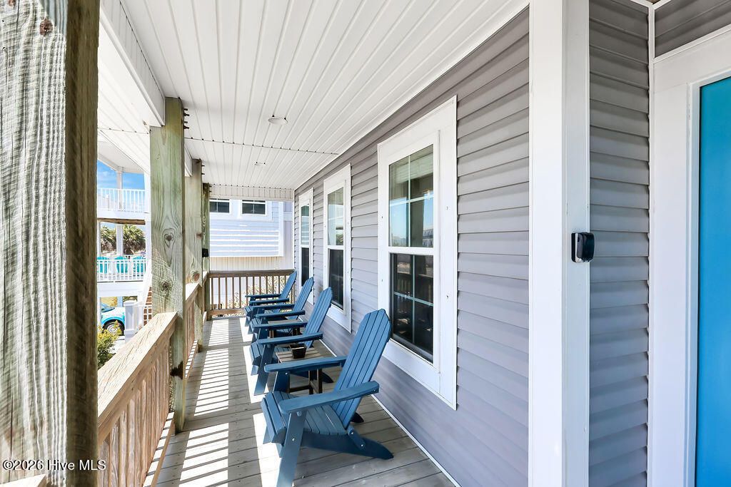Photo of 118 W Dolphin Drive, Oak Island, NC 28465 (MLS # 100565368)
