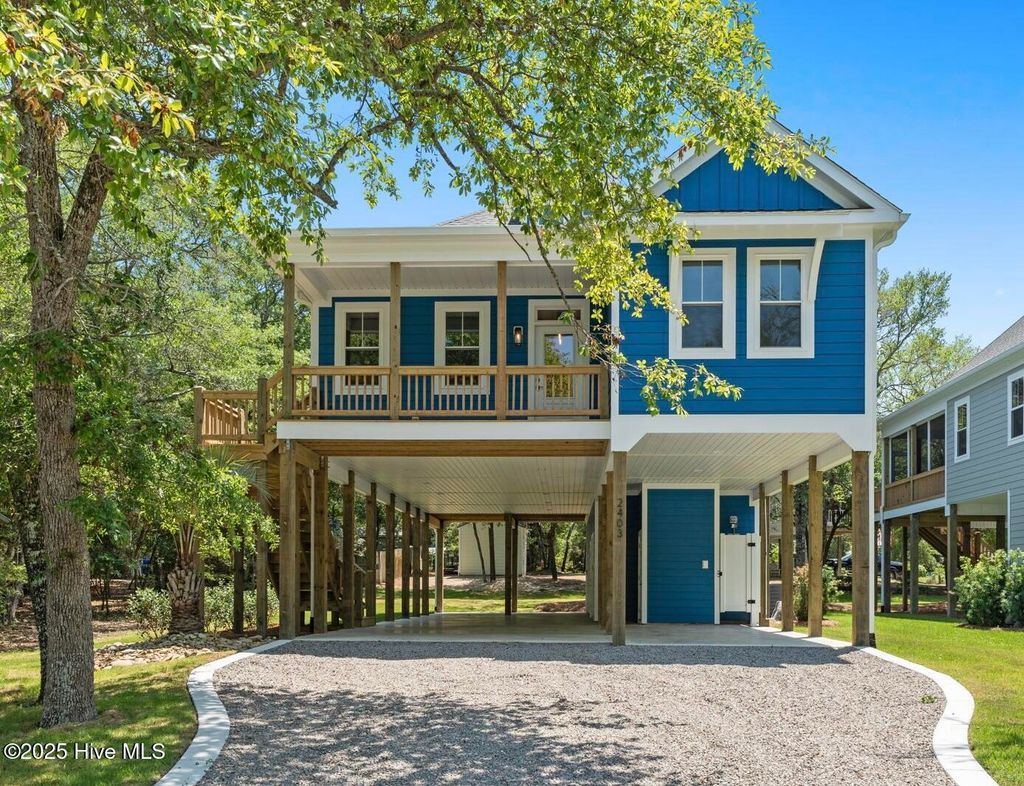Photo of 2403 E Yacht Drive, Oak Island, NC 28465 (MLS # 100486377)