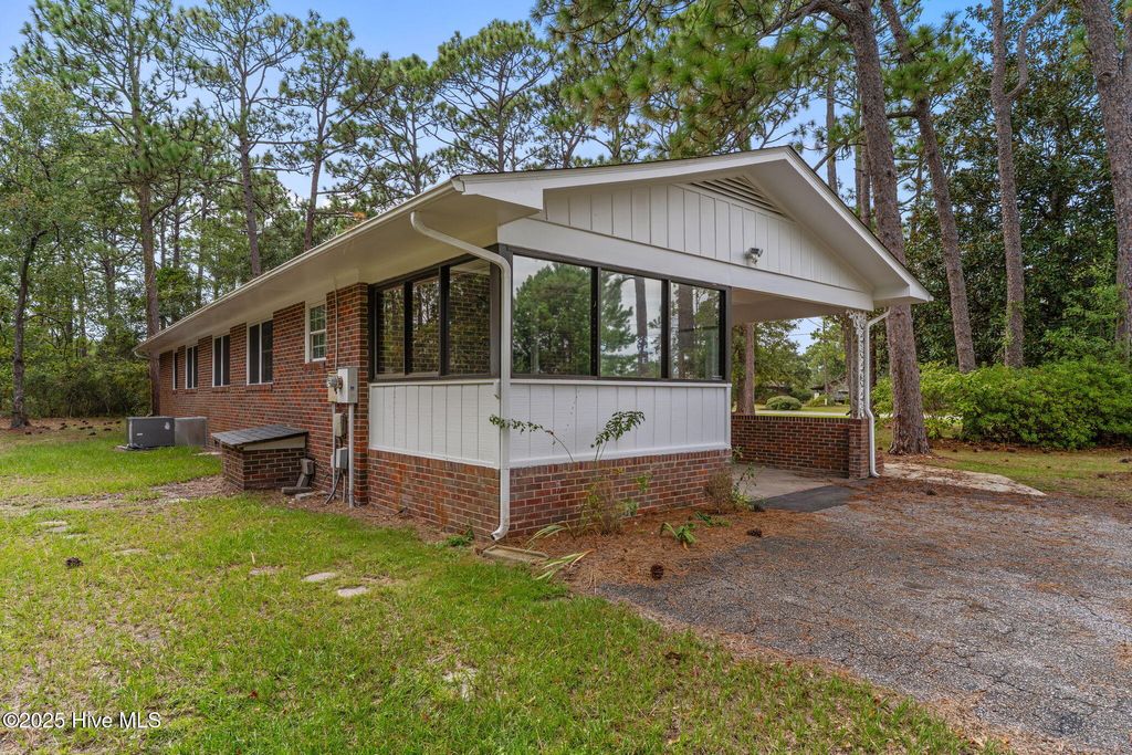 Photo of 198 E Boiling Spring Road, Southport, NC 28461 (MLS # 100529957)