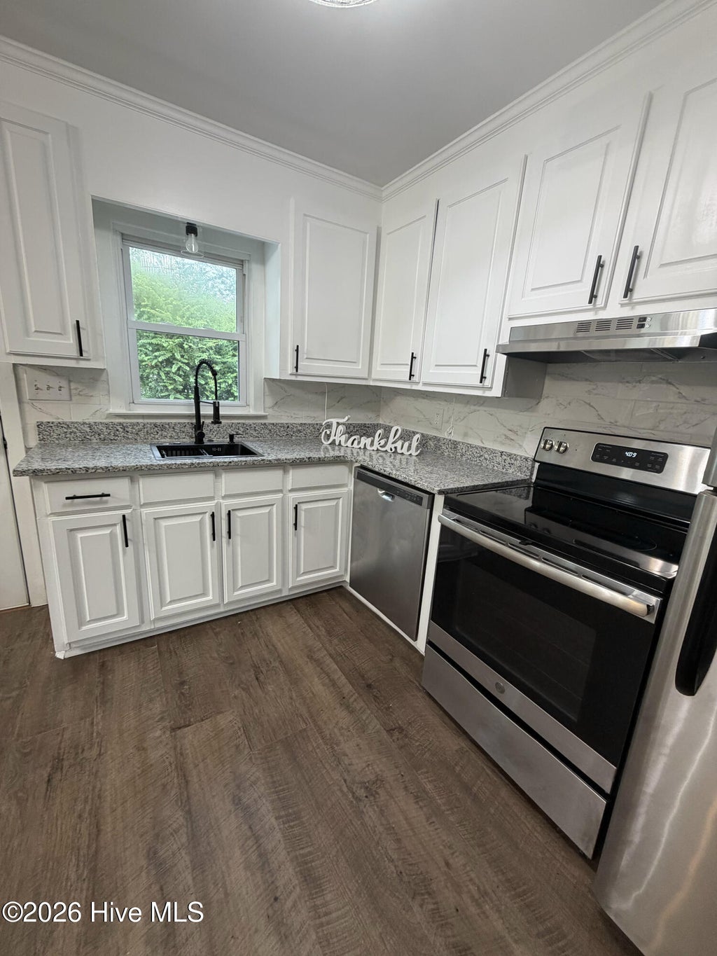 Photo of 204 E Branch Street, Benson, NC 27504 (MLS # 100600231)