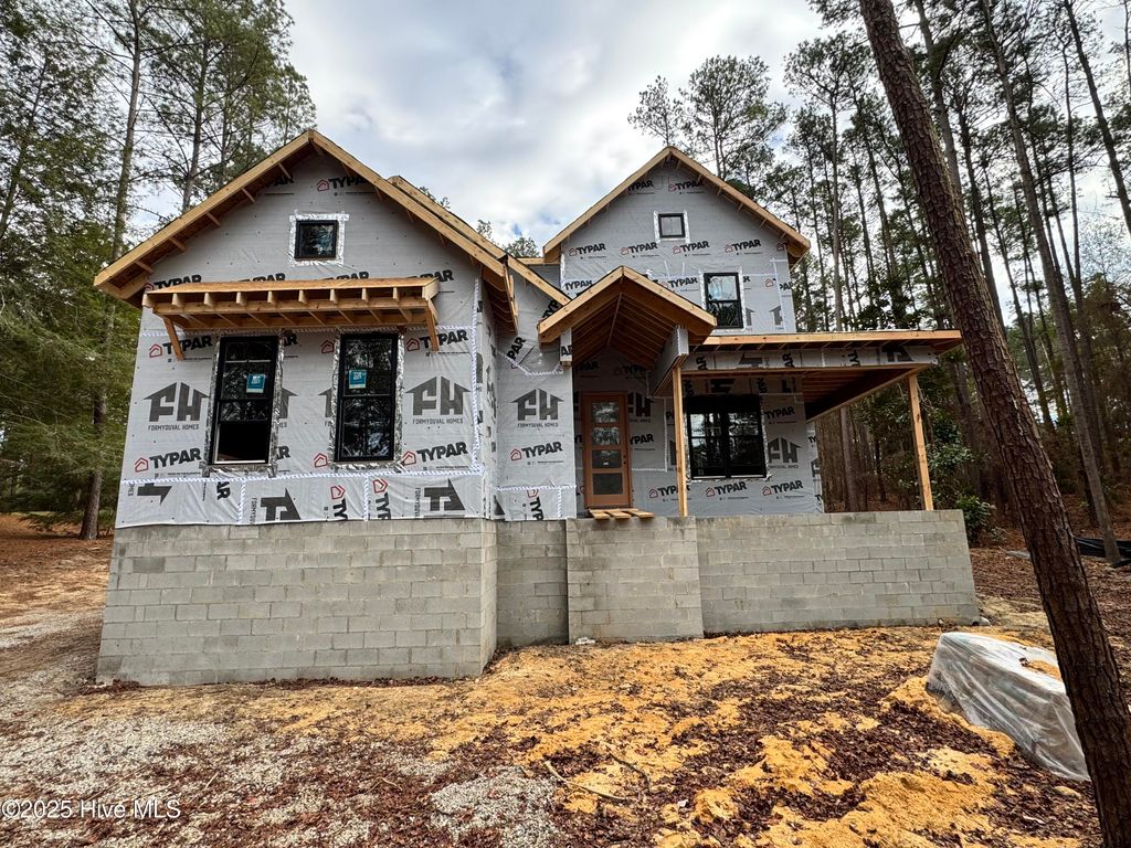 Photo of 13 Pine Lake Drive, Whispering Pines, NC 28327 (MLS # 100526005)