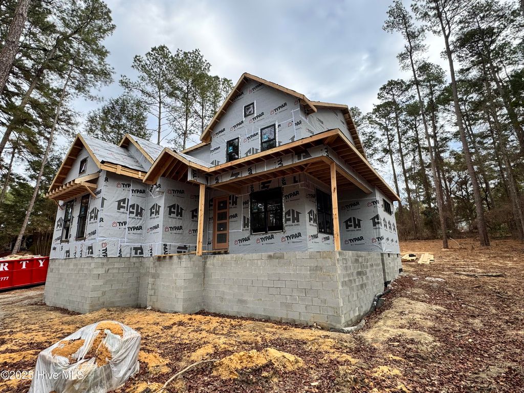 Photo of 13 Pine Lake Drive, Whispering Pines, NC 28327 (MLS # 100526005)
