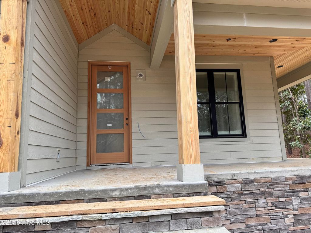 Photo of 13 Pine Lake Drive, Whispering Pines, NC 28327 (MLS # 100526005)