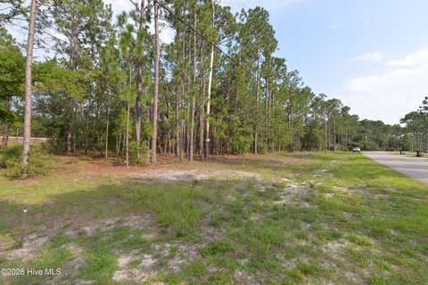 Photo of 873 Eden Drive, Southport, NC 28461 (MLS # 100598945)