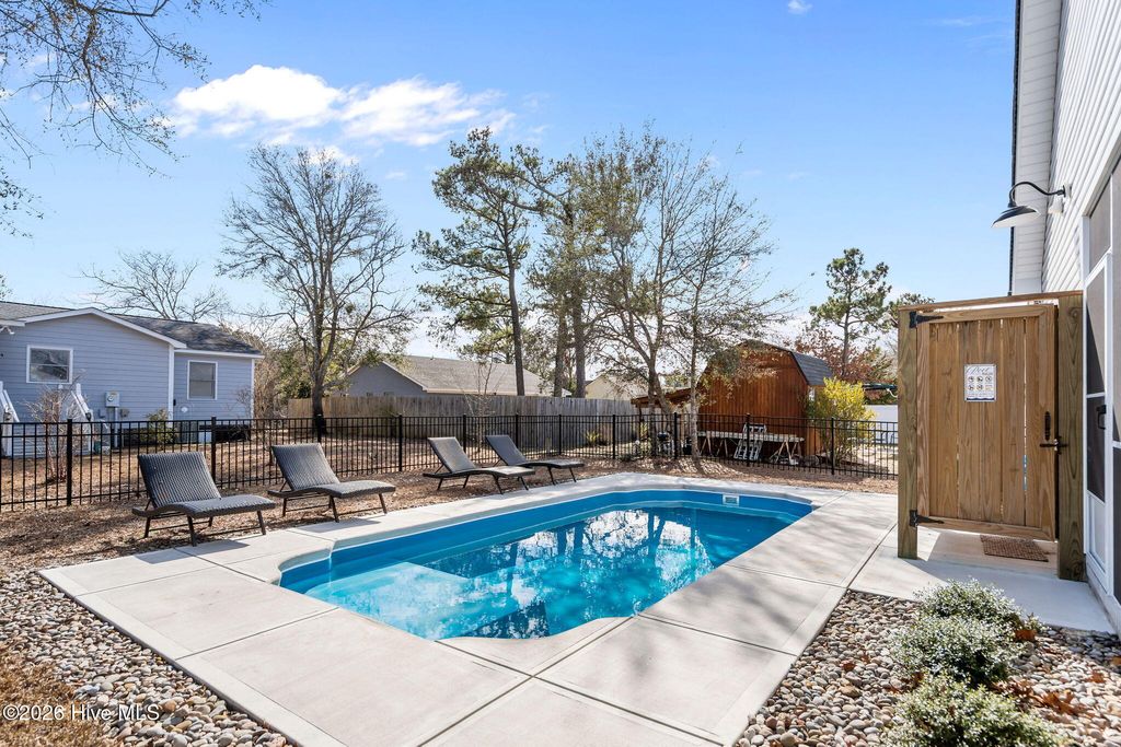 Photo of 134 NE 5th Street, Oak Island, NC 28465 (MLS # 100552076)