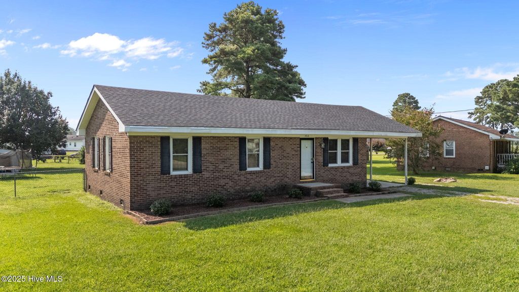 Photo of 304 Minshall Drive, Stantonsburg, NC 27883 (MLS # 100525781)