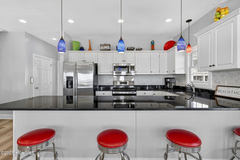 Tiny photo for 874 Villas Drive, North Topsail Beach, NC 28460 (MLS # 100544779)