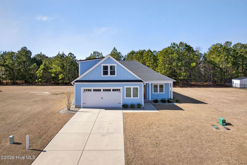 Photo of 460 Summerhouse Drive, Holly Ridge, NC 28445 (MLS # 100552112)