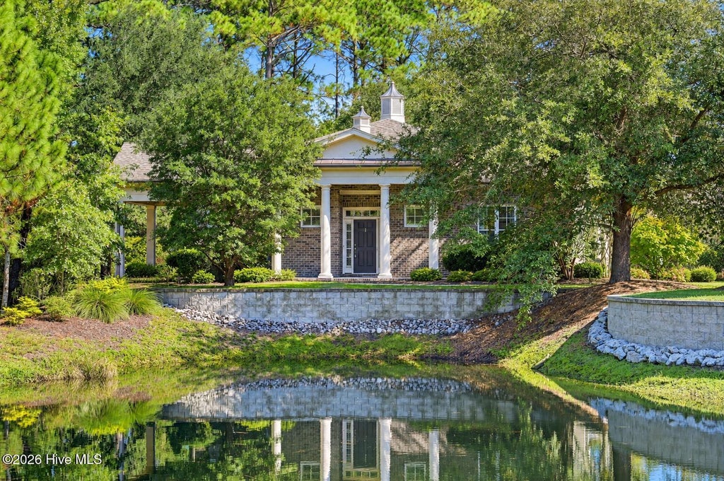 Photo of 4461 Golf Cottage Drive # 1, Southport, NC 28461 (MLS # 100610769)