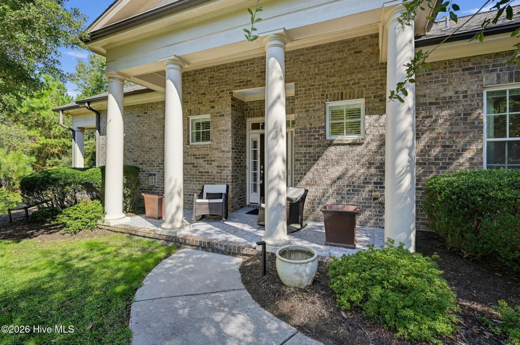 Photo of 4461 Golf Cottage Drive # 1, Southport, NC 28461 (MLS # 100610769)