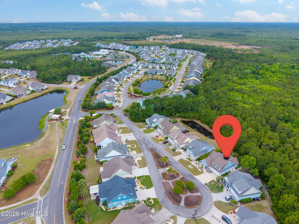 Photo of 3288 Beach Cove Lane, Southport, NC 28461 (MLS # 100567926)