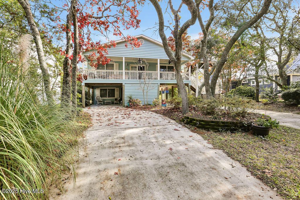 Photo of 302 SE 79th Street, Oak Island, NC 28465 (MLS # 100543707)
