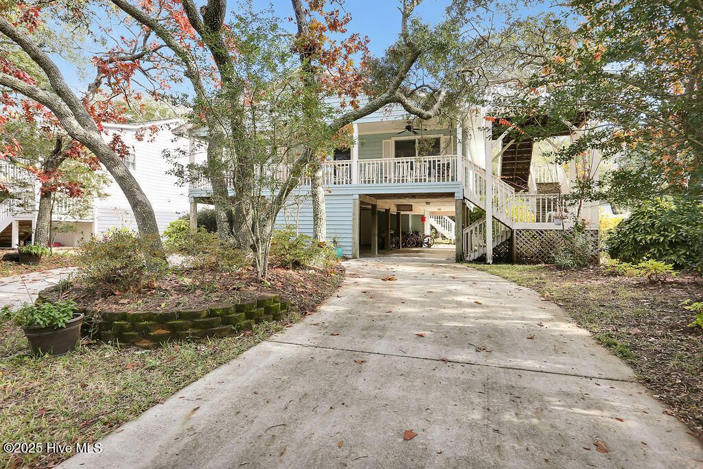 Photo of 302 SE 79th Street, Oak Island, NC 28465 (MLS # 100543707)
