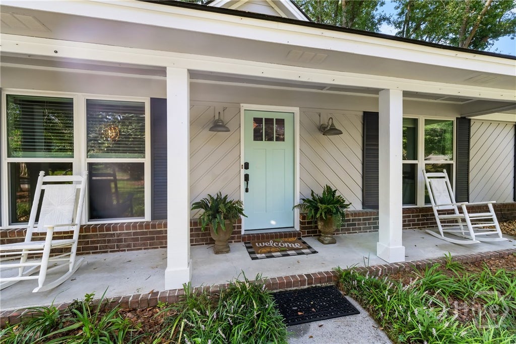 Photo of 100 Strathy Hall Drive, Richmond Hill, GA 31324 (MLS # SA361498)