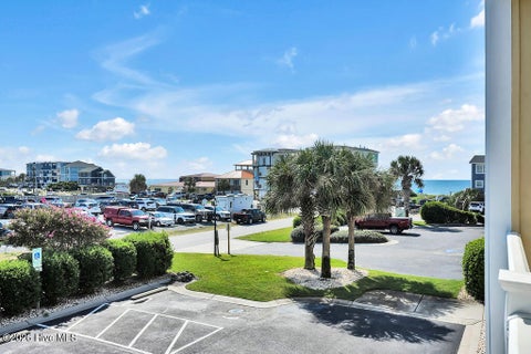 Tiny photo for 700 Ocean Drive #Unit 104, Oak Island, NC 28465 (MLS # 100606188)