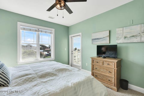 Tiny photo for 700 Ocean Drive #Unit 104, Oak Island, NC 28465 (MLS # 100606188)