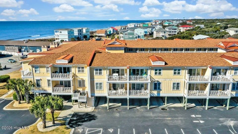 Tiny photo for 700 Ocean Drive #Unit 104, Oak Island, NC 28465 (MLS # 100606188)