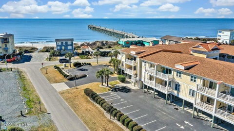 Tiny photo for 700 Ocean Drive #Unit 104, Oak Island, NC 28465 (MLS # 100606188)