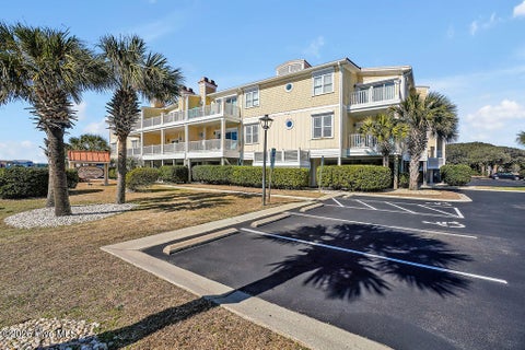 Tiny photo for 700 Ocean Drive #Unit 104, Oak Island, NC 28465 (MLS # 100606188)