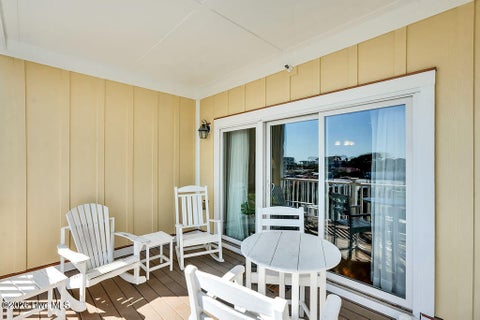 Tiny photo for 700 Ocean Drive #Unit 104, Oak Island, NC 28465 (MLS # 100606188)
