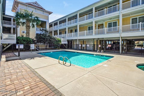 Tiny photo for 700 Ocean Drive #Unit 104, Oak Island, NC 28465 (MLS # 100606188)