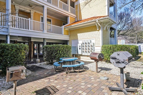 Tiny photo for 700 Ocean Drive #Unit 104, Oak Island, NC 28465 (MLS # 100606188)