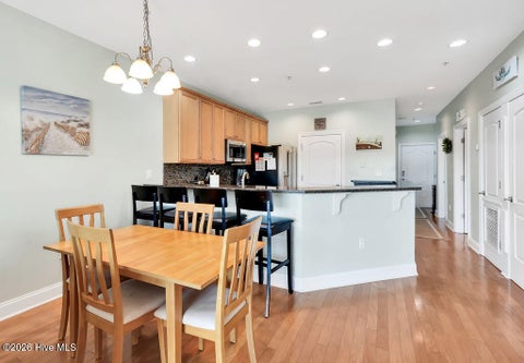 Tiny photo for 700 Ocean Drive #Unit 104, Oak Island, NC 28465 (MLS # 100606188)