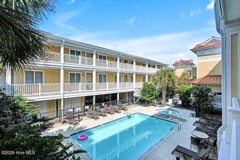 Tiny photo for 700 Ocean Drive #Unit 104, Oak Island, NC 28465 (MLS # 100606188)