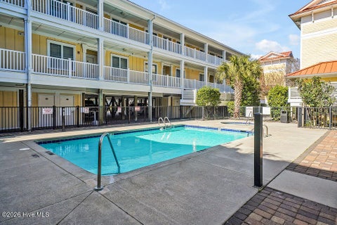 Tiny photo for 700 Ocean Drive #Unit 104, Oak Island, NC 28465 (MLS # 100606188)