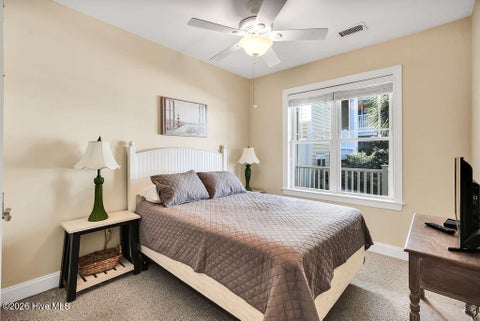 Tiny photo for 700 Ocean Drive #Unit 104, Oak Island, NC 28465 (MLS # 100606188)