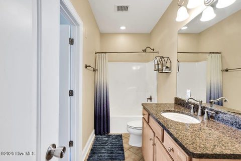 Tiny photo for 700 Ocean Drive #Unit 104, Oak Island, NC 28465 (MLS # 100606188)